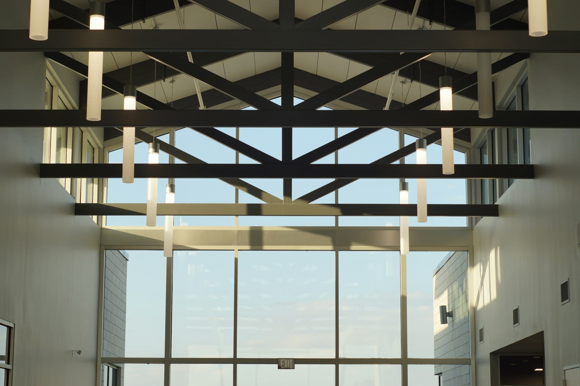 A modern glass-walled office building interior